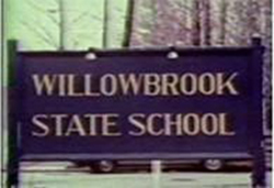  A large wooden sign with electric lights and the words “Willowbrook State School” that stood at the Victory Boulevard entrance from the 1960s into the 1970s.
