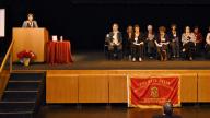 People on stage during Induction Ceremony 