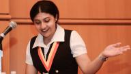 Student with a microphone