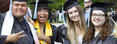 Graduating CSI students cheerfully celebrating