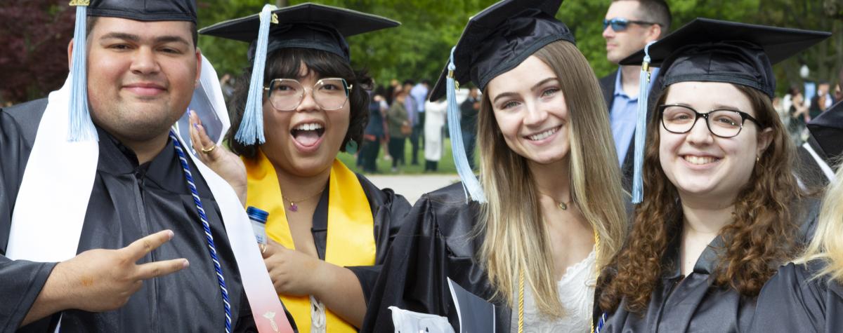 Graduating CSI students cheerfully celebrating