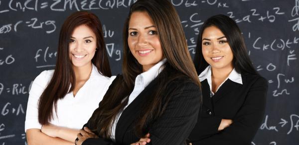 Mathematics department  female students in front of a chalkboard