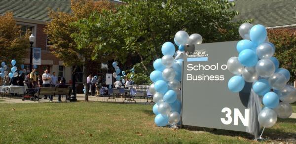 school of business sign and balloons