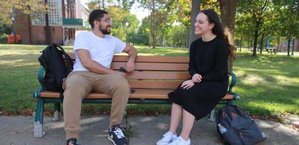 Students Seated on a Bench