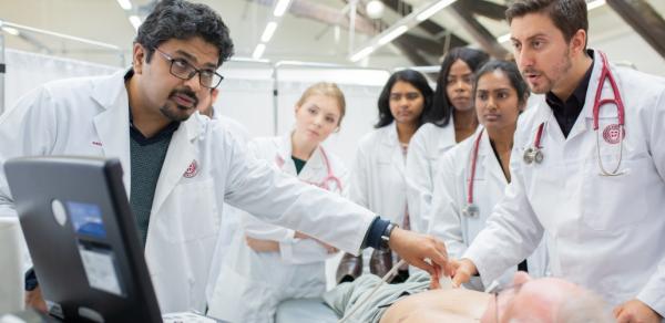 SGU Students with male patient