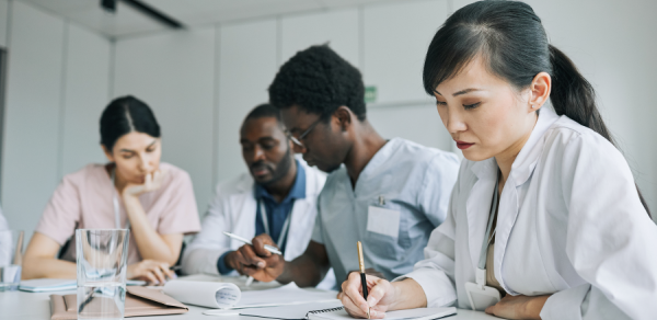 A group of doctors working at a table
