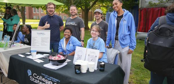 a group of students wearing t-shirts with CSI Logo 