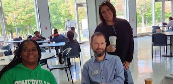 3 people in a cafeteria