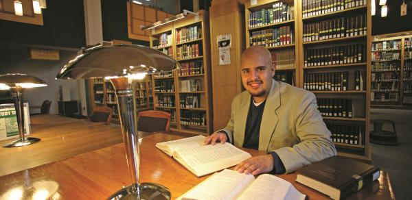 student in library