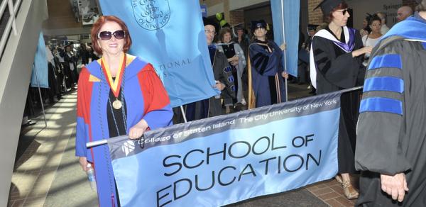 SOE Faculty with School of Education Banner