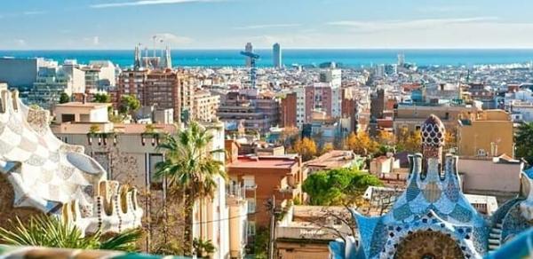 Barcelona's vibrant, colorful mosaics and unique architecture,  stunning views of the city from its terraced areas