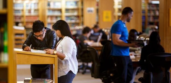 students in library