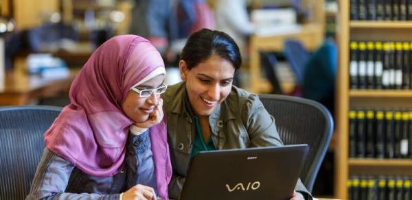 two women in library