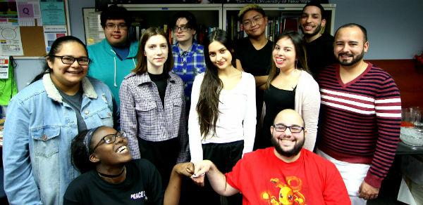 Students and the LGBTQ Resource Center Coordinator pose for a picture. Many friendships have been formed at the Center.