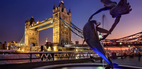 London Bridge at night is illuminated by  colorful LED light sequences 