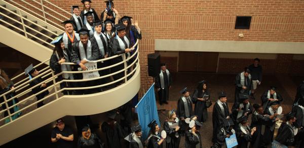 CSI Graduates on stairs