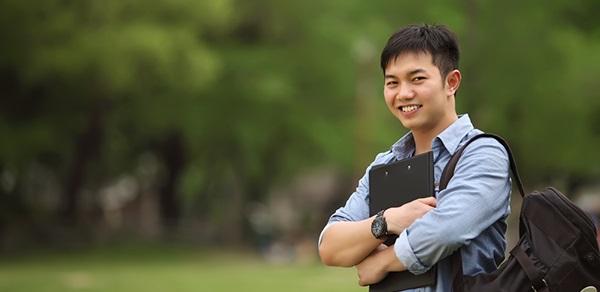 health wellness faq - male student on campus image