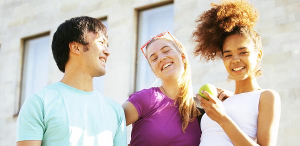  Three Students Outside Smiling