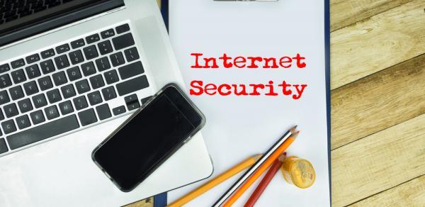 laptop keyboard and Internet Security verbiage