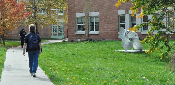 student walking on campus