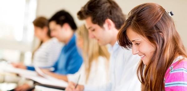 Students Sitting At Desk