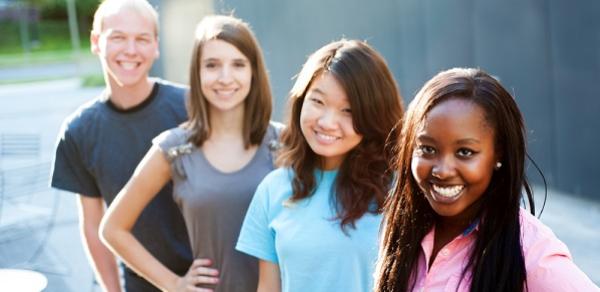 Students Posing Outside Hands On Hips