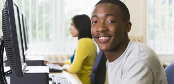 Student At Computer Working