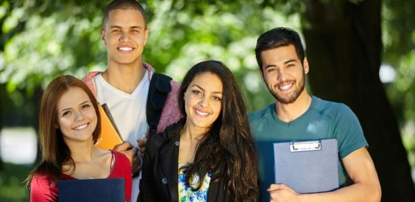 Students Standing Outside With Books