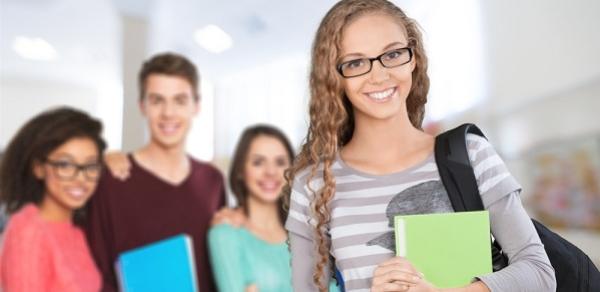 Students Walking In Hallway