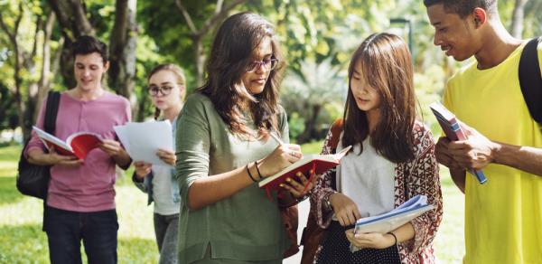 Students Outside Walking On Campus