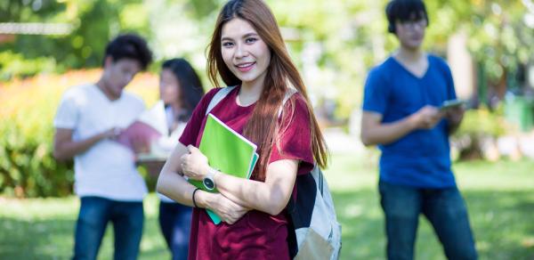 Students Outside With Books