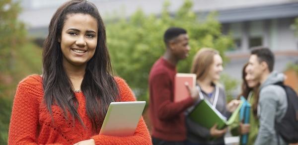 female student holding book