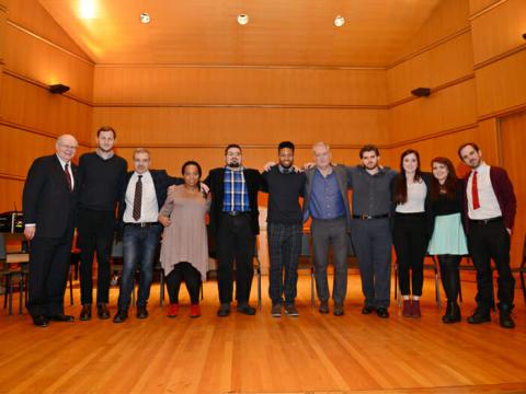 Gathering in the Center for Performing Arts (from left to right) President William Fritz and the Head of Film, TV, and New Media at the French Embassy, Mathieu Fournet, and CSI students.