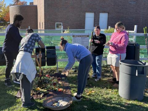 Composting workshop 5 5 Creative Exchange and CSI Students are processing the pre-consumer waste outside 1 C Campus Center.