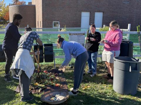 5 Creative Exchange and CSI Students are processing the pre-consumer waste outside 1 C Campus Center.