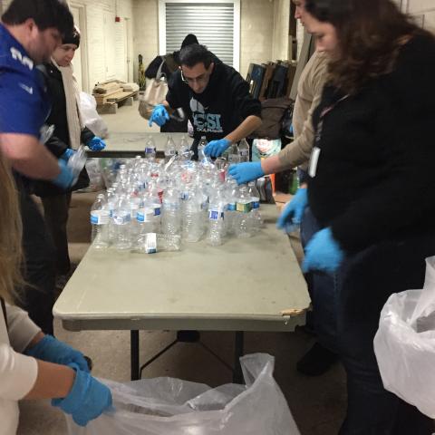students are sorting bottles