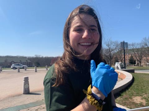 Natalia gives a thumbs up to the campus cleanup.