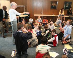 Young Children in a Class Raising Their Hand Young Children in a Class Raising Their Hand