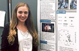Student presenting her work at conference