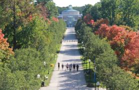 Aerial Shot Of Students On Alumni Walk Facing the Library