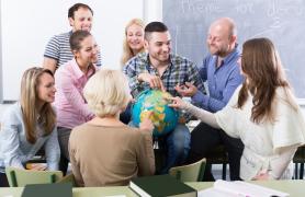 group of students around globe