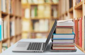 library books and laptop