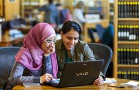 two women in library