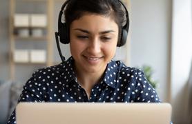 Picture of female student viewing a laptop