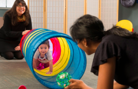 Baby solving tunnel task.