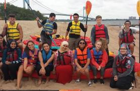 Students participating in kayaking event