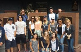 Members of club at baseball game outing