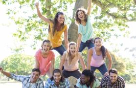 Students building human pyramid