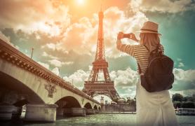 Student taking photo of Eiffel Tower