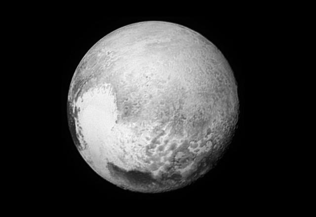 MINOR PLANET PLUTO WITH SURFACE FEATURES FROM SPACE